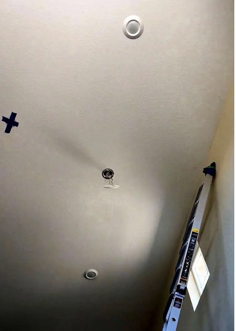 The builder fixture that was there, and the height it had to come down from.