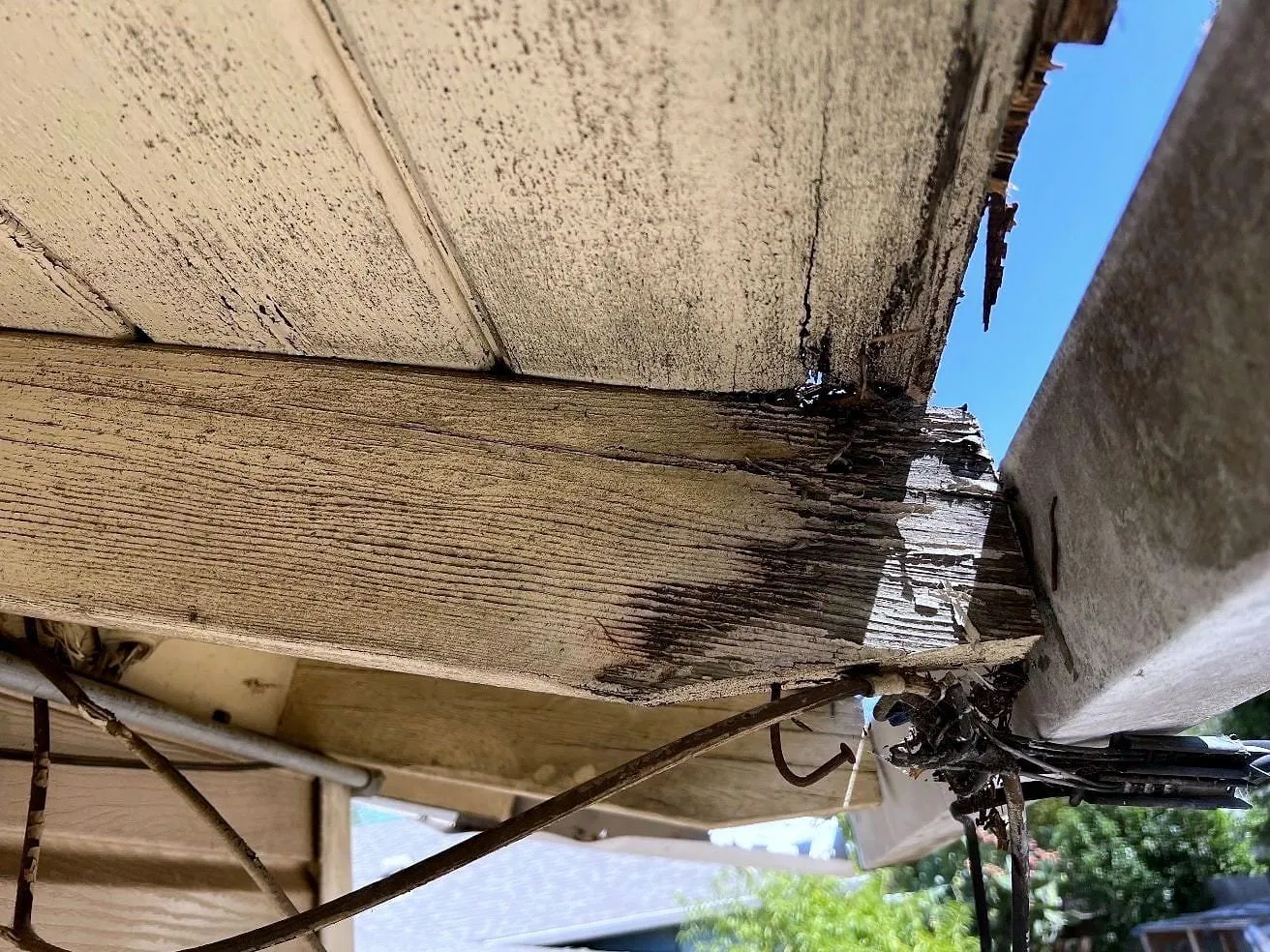 Before — Rotted fascia torn out and rebuilt