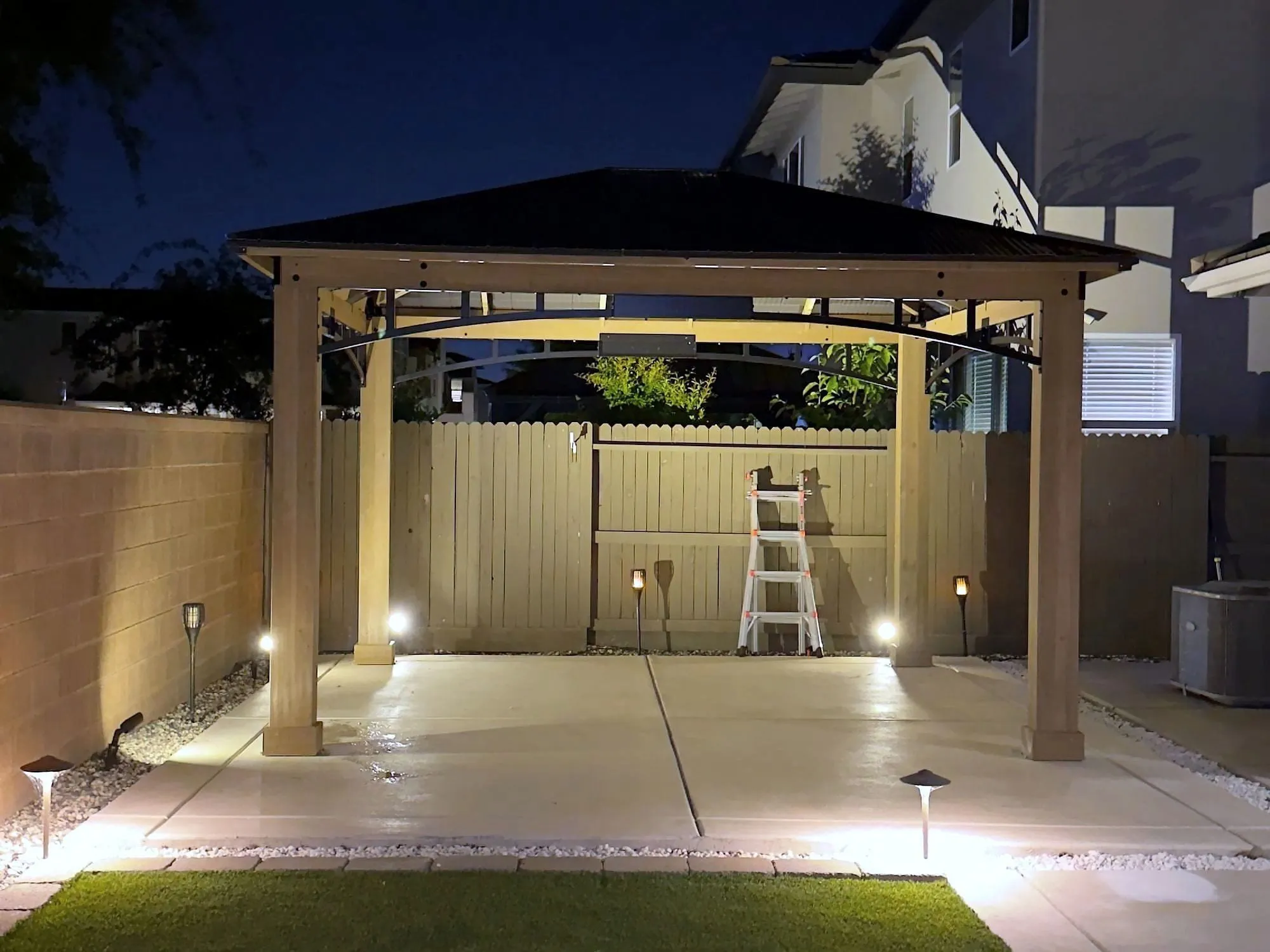 After — Flat-pack on the slab to a lit gazebo