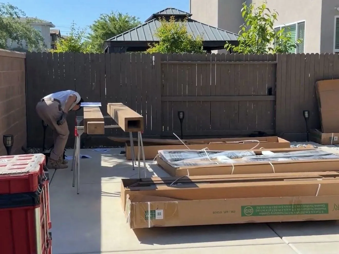 Before — Flat-pack on the slab to a lit gazebo