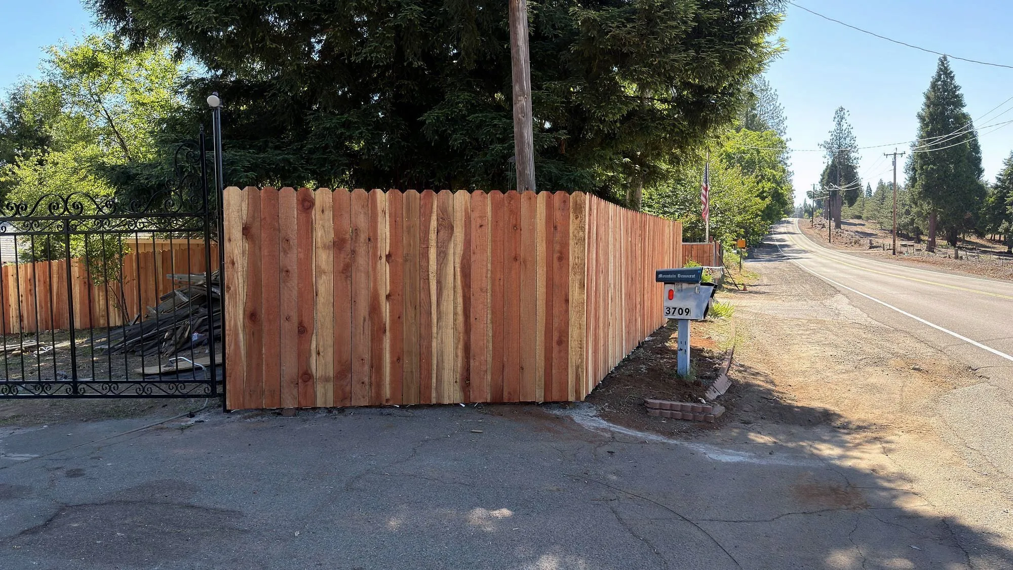 New redwood run, posts set in concrete.