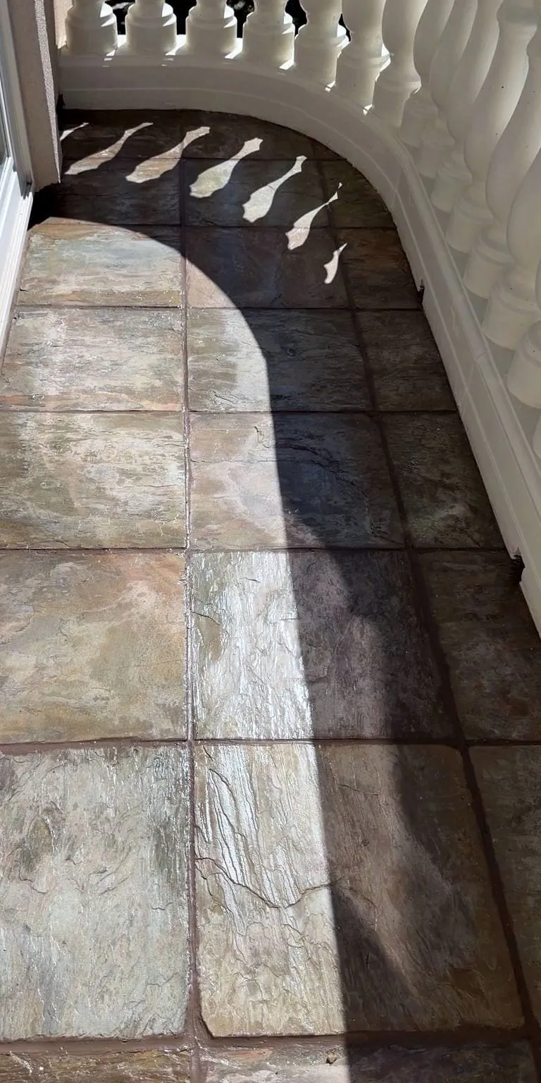 Balcony tile floor cleaned and sealed